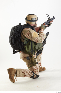 Robert Watson US Navy Seals Pose7 aiming gun kneeling whole…